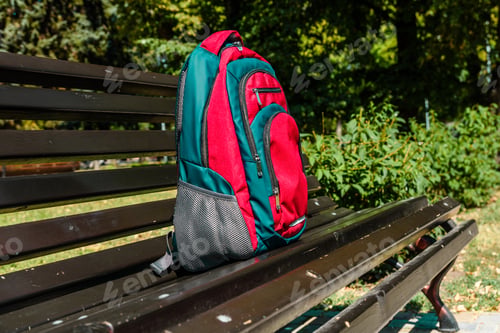 Preview: Tourist Backpack On Bench In City Park