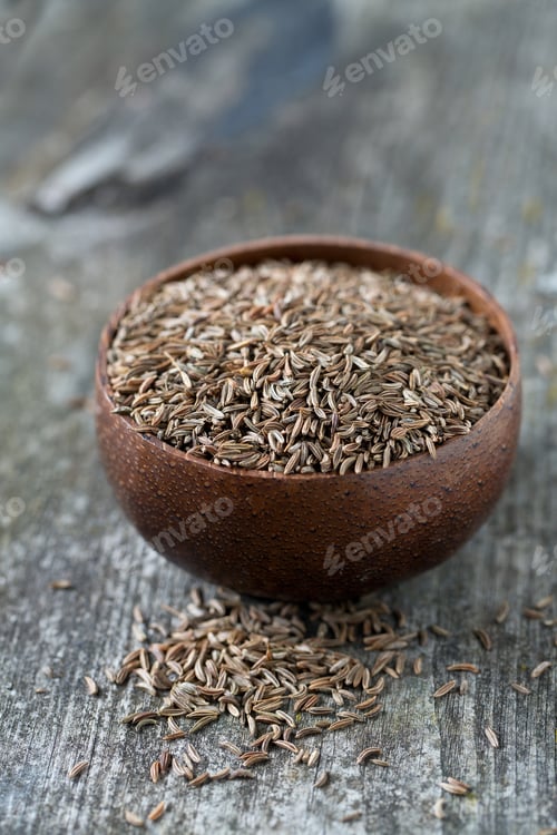 Preview: Dried Cumin On Wooden Surface