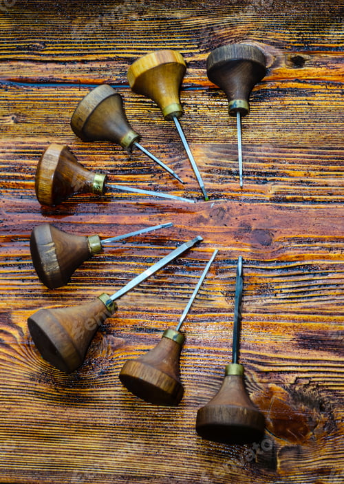 Preview: Different Gravers For Jewelry On A Wooden Background