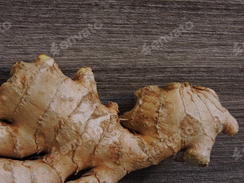 Preview: Ginger On A Wooden Background. Copy Space. Macro.