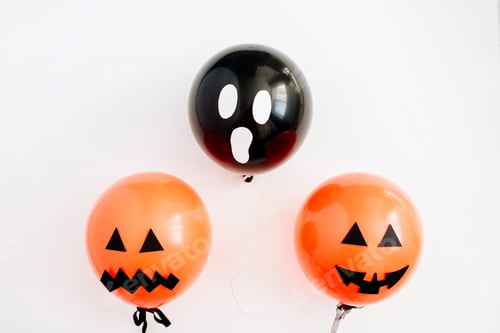 Preview: Halloween Minimal Concept. Three Balloons With Funny Smiling And Scary Faces On White Background