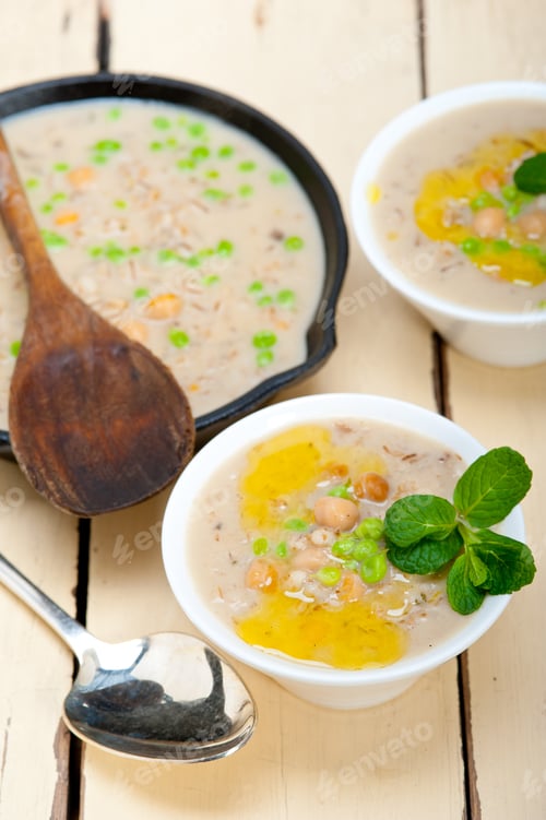 Preview: Hearty Middle Eastern Chickpea And Barley Soup With Mint Leaves On Top