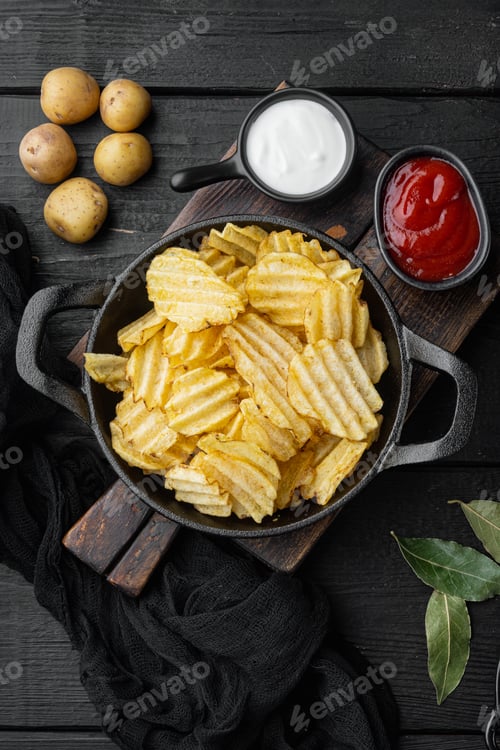 Preview: Salty Potato Chips Snack Set, On Black Wooden Background, Top View Flat Lay