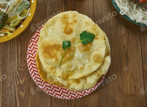 Preview: Chelpek, Traditional Central Asian Flatbread, Kyrgyz Cuisine, Traditional Assorted Dishes, Top View.