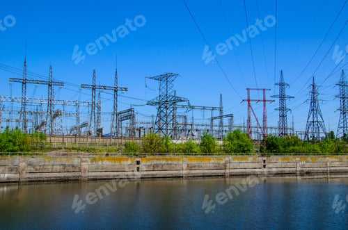 Preview: High Voltage Power Lines And Towers Against Blue Sky