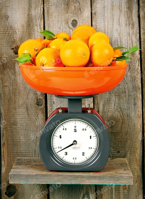 Preview: Tangerines On Scales On A Wooden Shelf.