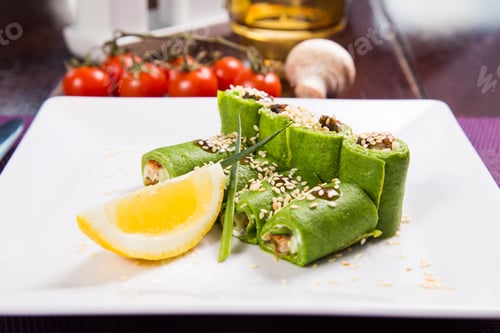 Preview: Green Roll With Spinach, Eel And Sesame On White Plate