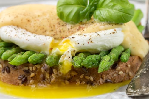 Preview: Bread Toast With Sesame And Flax Seed, Asparagus, Poached Egg And Hollandaise Sauce. A Traditional
