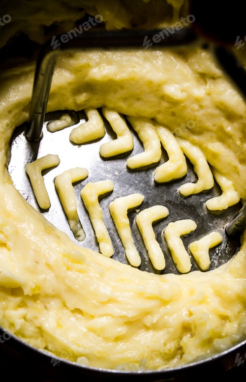 Preview: Potato Food . Cooking Mashed Potatoes With A Pestle Close Up .