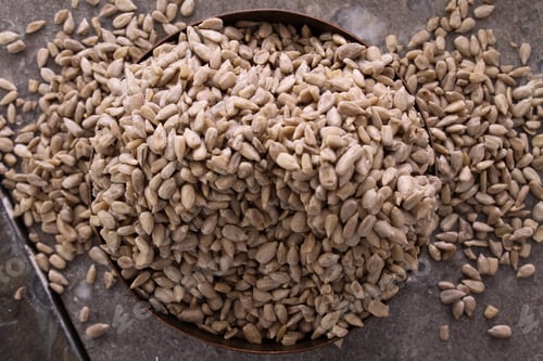 Preview: Fresh Hulled Sunflower Seeds In Copper Dish