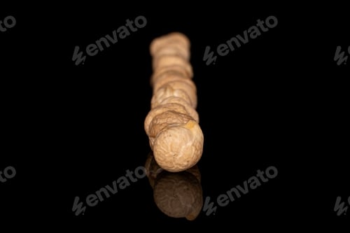 Preview: Lot Of Whole Fresh Tan Chickpea In Row Isolated On Black Glass