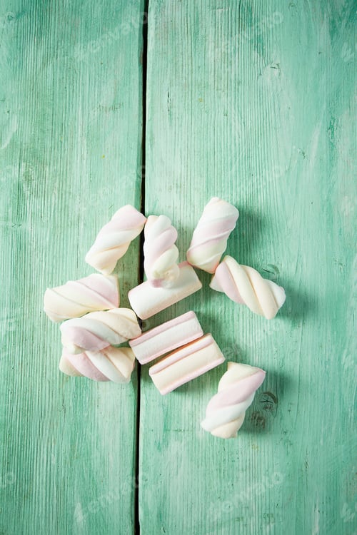 Preview: Marshmallow On Turquoise Surface