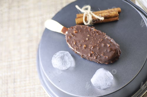 Preview: Dessert Chocolate Ice Cream With Nuts On A Wooden Stick
