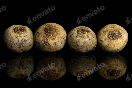 Preview: Group Of Four Whole Raw Red Beetroot Isolated On Black Glass