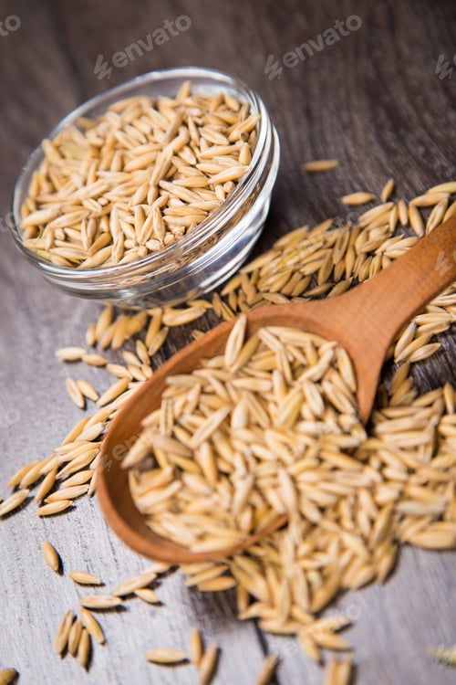 Preview: Ripe Dry Oat Is In A Wooden Spoon, In A Studio