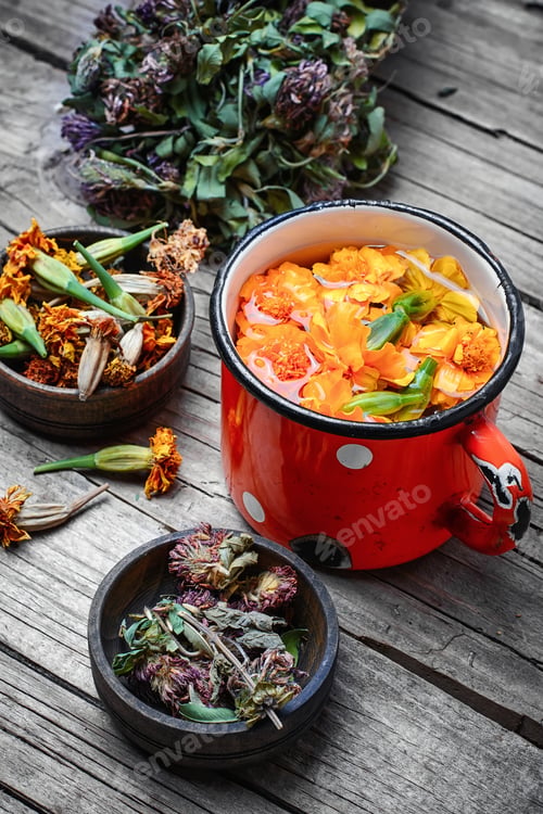 Preview: Iron Mug With Herbal Decoctions Of Clover And Marigolds