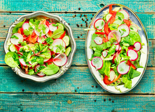 Preview: Vegan Salad Made From Radish,Pepper,Cabbage And Greens.Green Lettuce Salad On Wooden Background