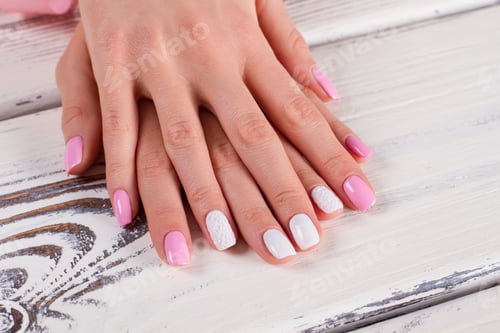 Preview: Gently Pink Manicure With Ornaments Close Up. Well-Groomed Female Hands.