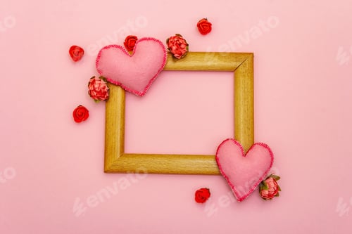 Preview: Valentine Day Or Wedding Concept With Soft Felt Hearts, Flowers And Wooden Frame. Light Pink