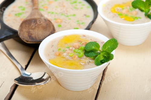 Preview: Hearty Middle Eastern Chickpea And Barley Soup With Mint Leaves On Top