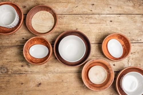 Preview: Handmade Empty Ceramic Dishes And Plates On Wooden Background. Collections Of Various Bowls