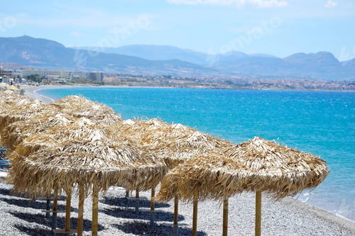Preview: Sun Umbrellas On The Beach In Loutraki, Greece.