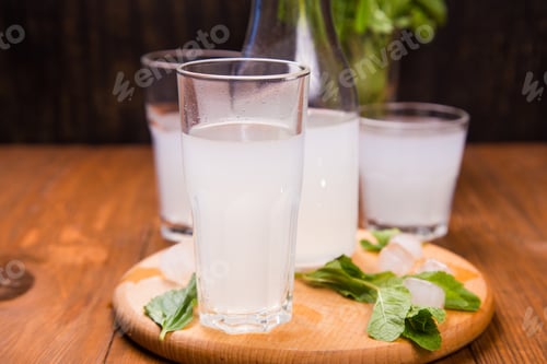 Preview: Fresh Soda Drink With Ice And Mint On Wooden Background