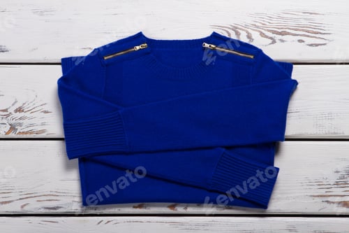 Preview: Blue Folded Sweater. Woman'S Casual Navy Pullover. Woolen Garment On White Shelf. New Item Of High