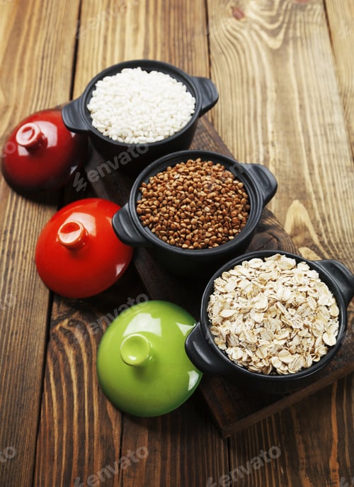 Preview: Buckwheat, Oats And Rice In A Ceramic Pot On The Table