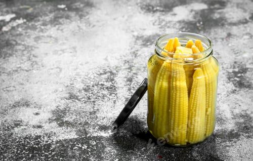 Preview: Marinated Corn In Glass Jar. On A Rustic Background.