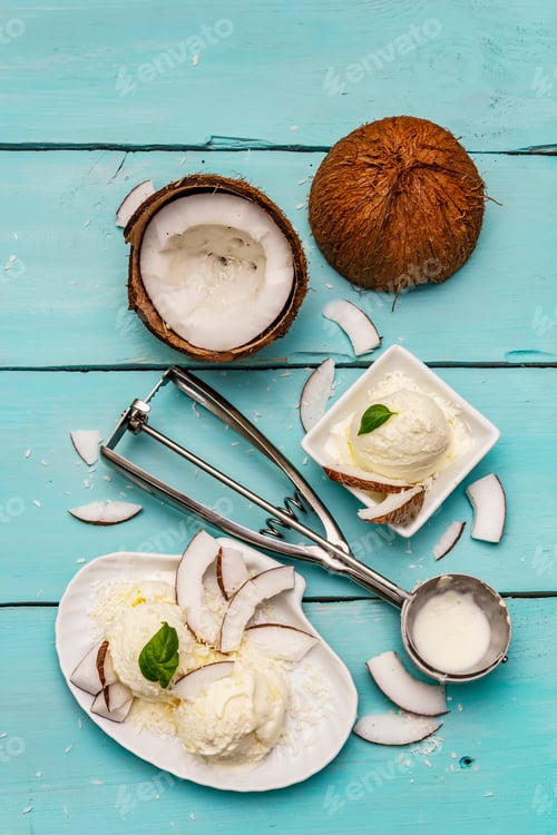 Preview: Lactose Free Coconut Ice Cream. Special Spoon, Halves Of Fruit, Flakes. Vegan Dessert Concept