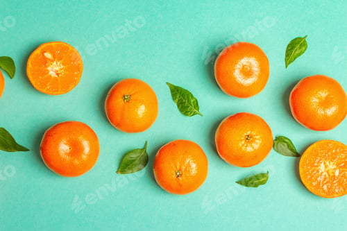 Preview: Ripe Juicy Tangerines And Fresh Leaves. Sunny Summer Turquoise Background, Top View