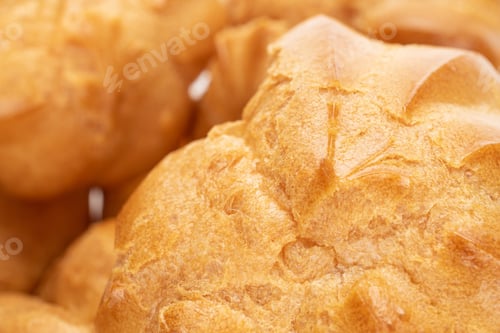 Preview: Lot Of Whole Baked Golden Profiterole Macro Isolated