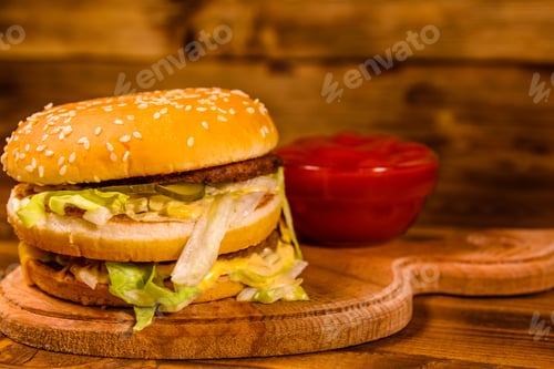 Preview: Hamburger And Sauce On Rustic Wooden Table