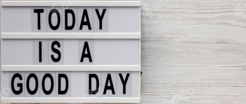 Preview: 'Today Is A Good Day' Words On A Modern Board On A White Wooden Surface, Top View. Overhead, From