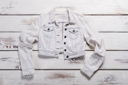 Preview: Short White Jacket. Short Jacket On Wooden Background. Lady'S Trendy Spring Outerwear. Special