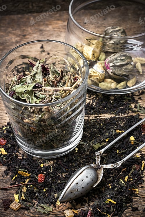 Preview: Tea Leaves Scattered On The Table In Country Style.Selective Focus