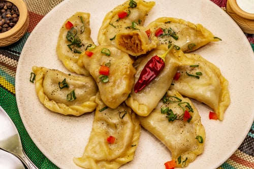 Preview: Dumplings Stuffed Stewed Cabbage And Sour Cream. Traditional Ukrainian Dish V-Arenyky. Healthy
