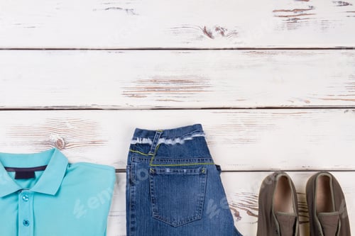 Preview: T-Shirt, Jeans, Sneakers, Collection Buy. Summer Casual Outfit On White Wooden Surface.