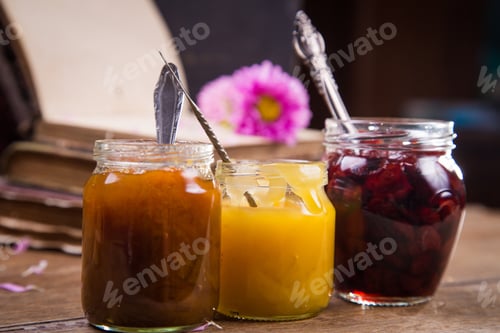 Preview: Set Of Jam And Honey In Glass Container With Flower And Book