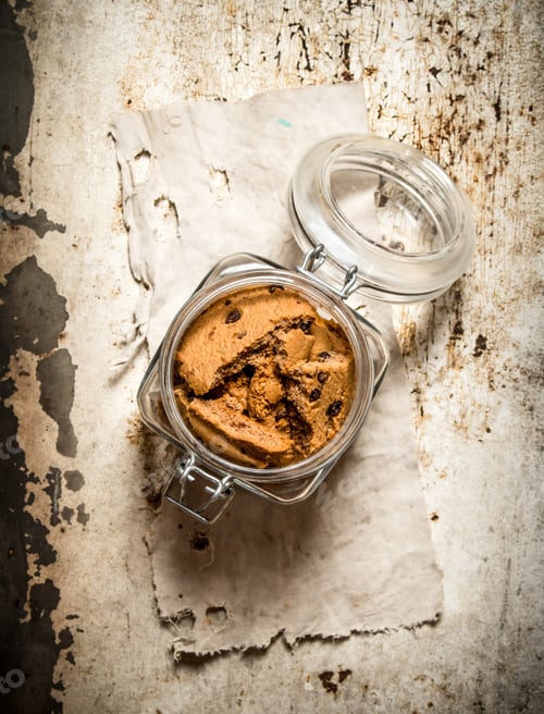Preview: Oatmeal Cookies In A Jar. On An Old Rustic Background .