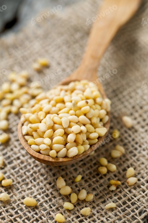 Preview: Pine Nuts In A Wooden Spoon