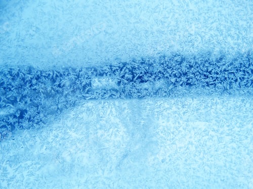 Preview: Snowflakes Ice Pattern With Sunlight On Winter Window Glass