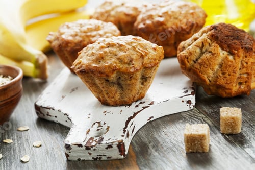Preview: Banana Muffins With Oat Flakes On The Table