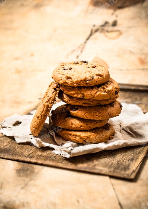 Preview: Oat Cookies On The Old Fabric . On Wooden Background.