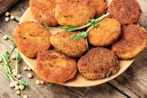 Preview: Vegetable Diet Cutlets Made From Green Peas On Wooden Table.Healthy Diet Food