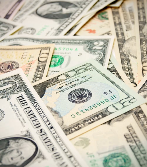 Preview: Assorted United States Currency Displayed in a Pile