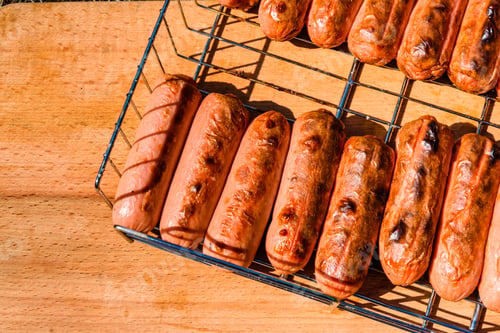 Preview: Roasted Sausages On A Rustic Wooden Table