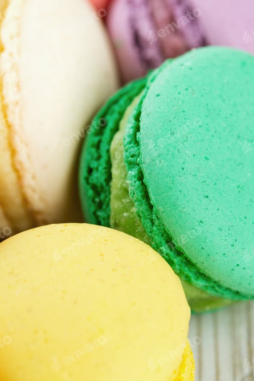 Preview: Colorful Macarons On Wooden Surface