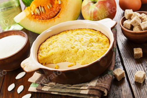 Preview: Pumpkin Casserole With Apple And Semolina On The Wooden Table